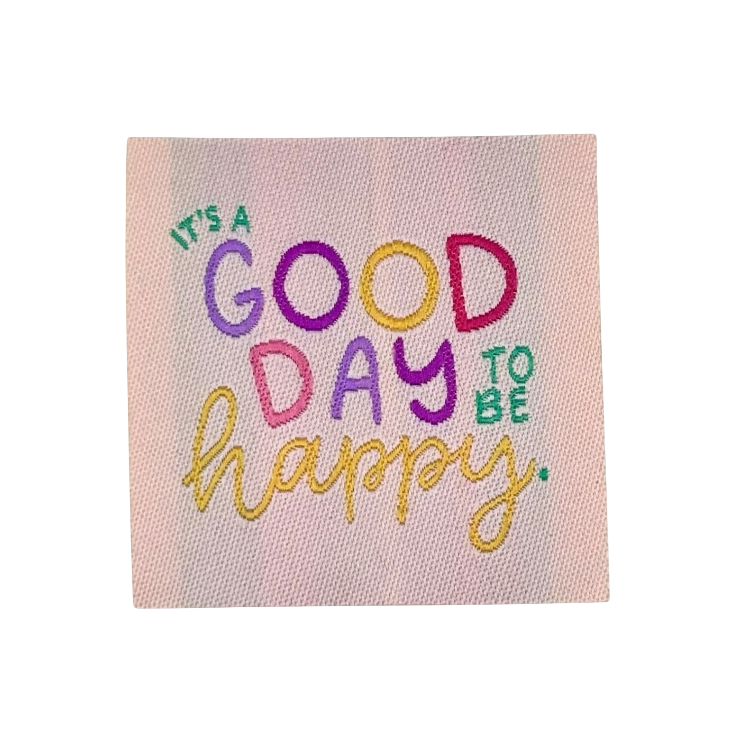 Geborduurde stoffen patch met kleurrijke tekst It's a good day to be happy op roze achtergrond